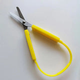 Ciseaux à ressorts jaune de 20cm pour adultes