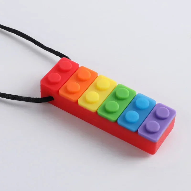 Fidget Toys - Collier Anti Stress à Mordiller en Silicone en Forme de Brique 🧱