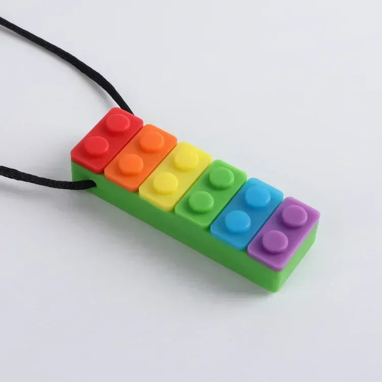 Fidget Toys - Collier Anti Stress à Mordiller en Silicone en Forme de Brique 🧱