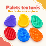 Lot de six palets sensoriels multicolores à manipuler, avec rainures, picots et reliefs variés.